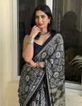 vibrant black ajrakh printed soft modal silk saree
