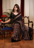 elegant and rich ajrakh design Midnight Bloom Saree